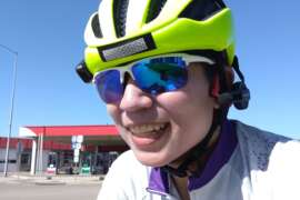 Kym Louie '08 in bike helmet
