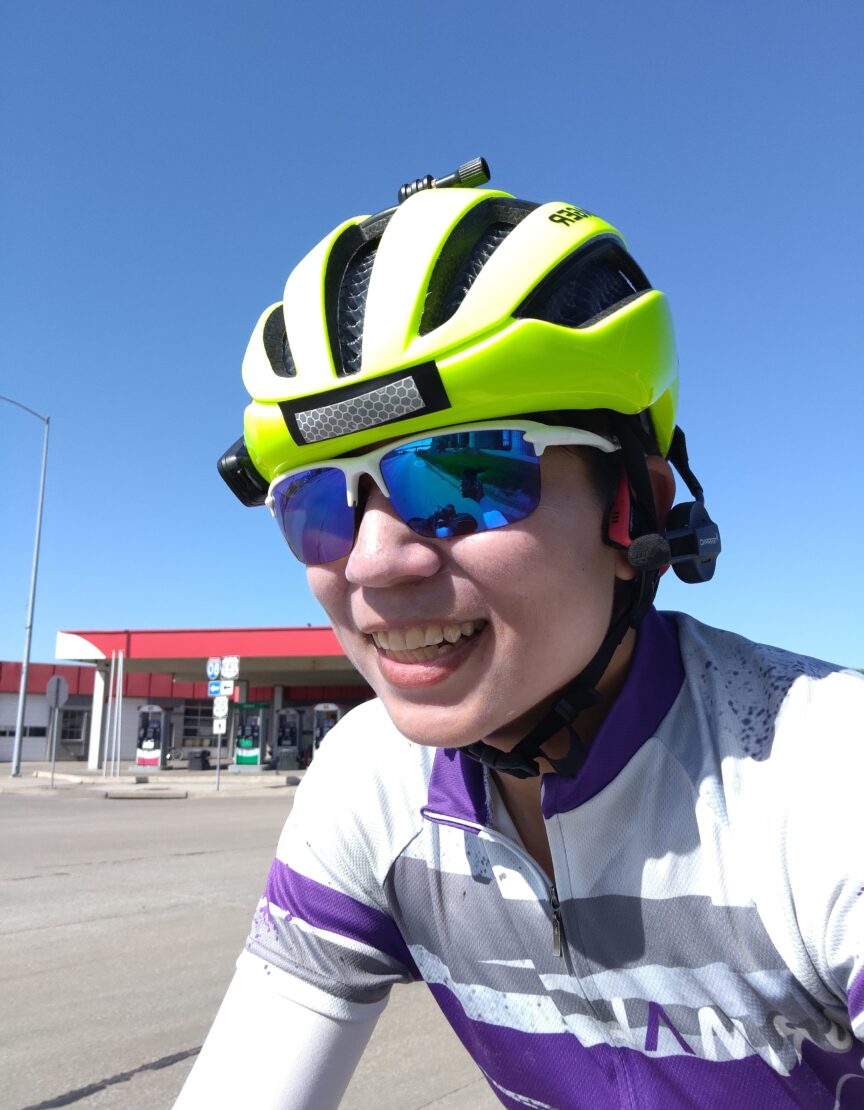 Kym Louie '08 in bike helmet