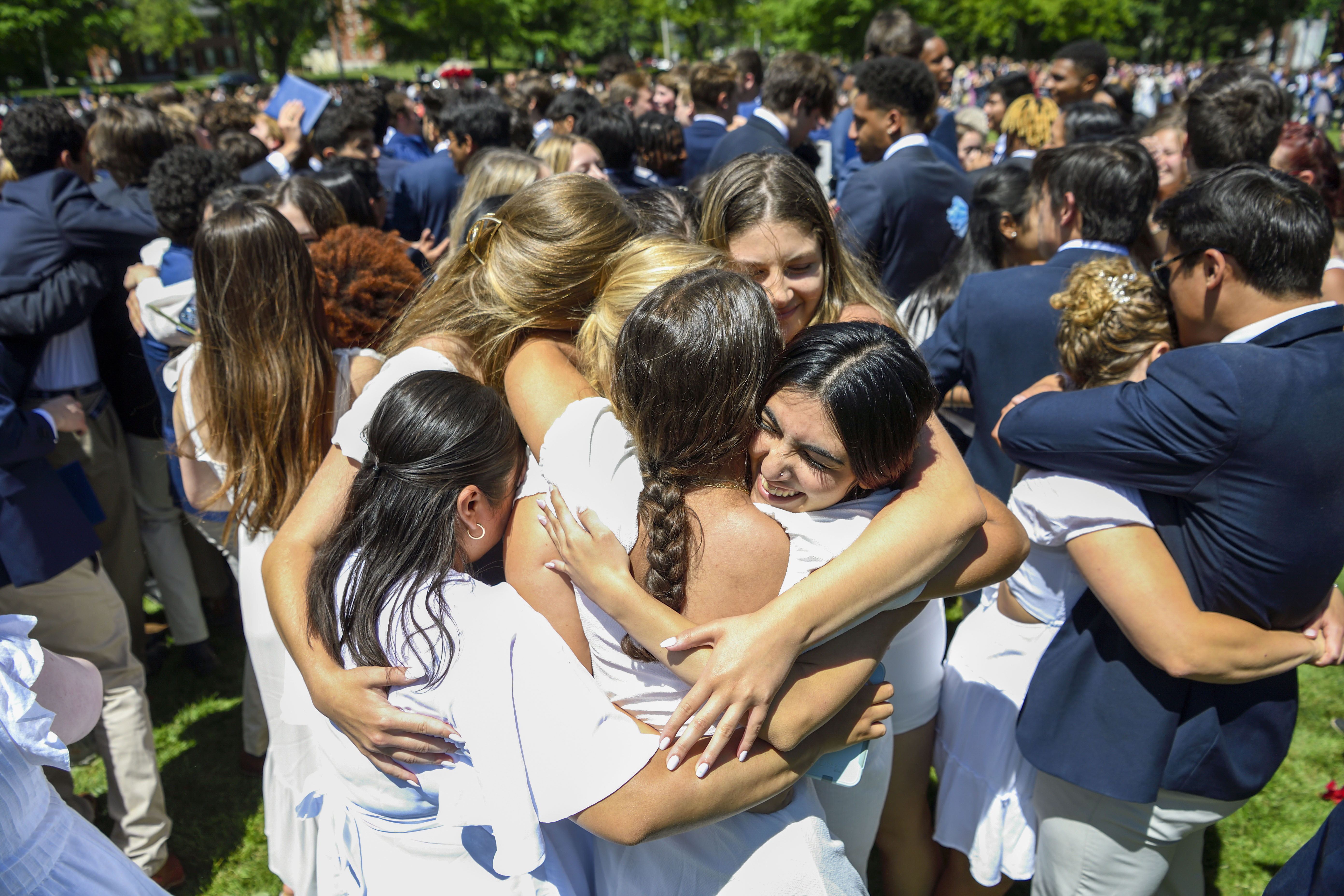 Andover students embracing at Commencement