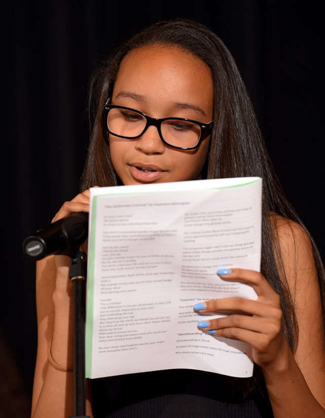 Student reading a poem