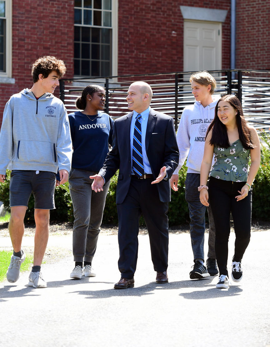 Jim Ventre walking with students