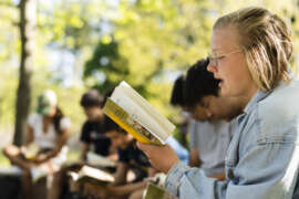 Student reading a book.