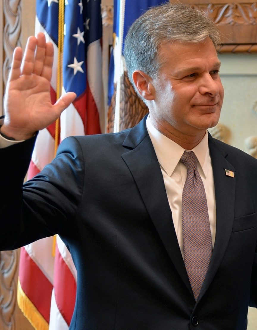 Chris Wray ’85 takes the oath of office during his swearing-in ceremony at the DOJ in 2017. Photo/FBI